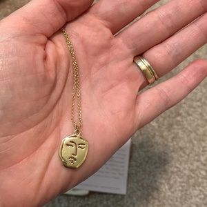 The Sanctuary Project face silhouette necklace